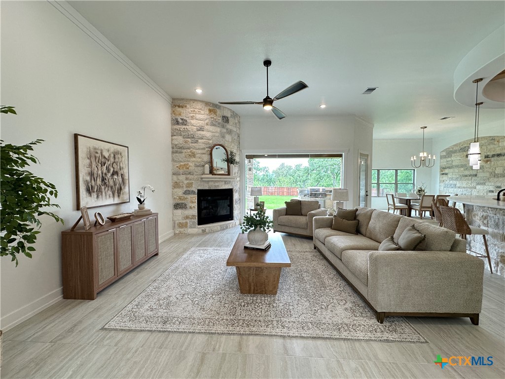 430 Dos Rios Drive Belton, TX 76513 - Photo 7 of 48 a living room with furniture and a fireplace