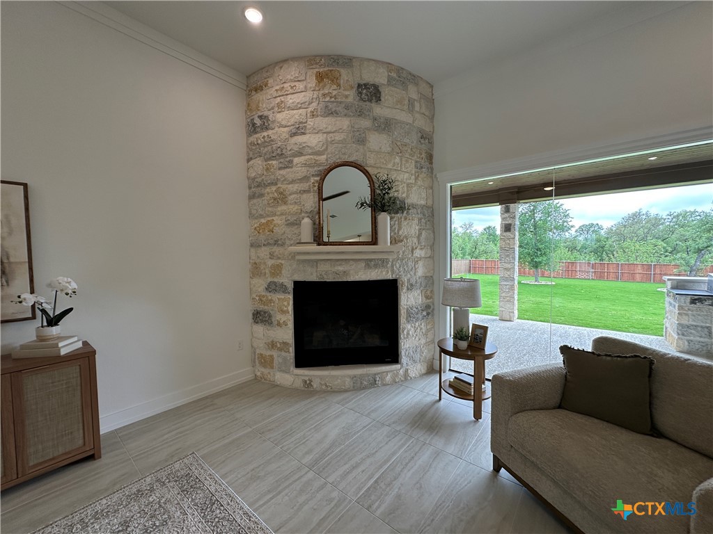 430 Dos Rios Drive Belton, TX 76513 - Photo 8 of 48 a living room with furniture and a fireplace