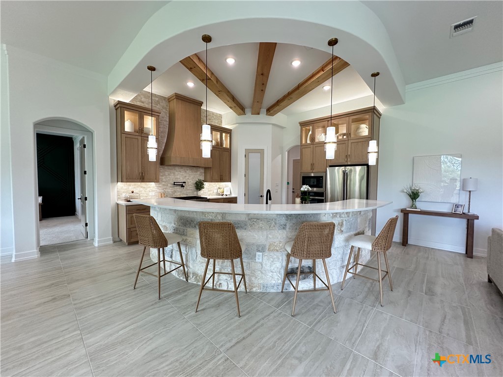 430 Dos Rios Drive Belton, TX 76513 - Photo 9 of 48 a view of a dining room with furniture and wooden floor