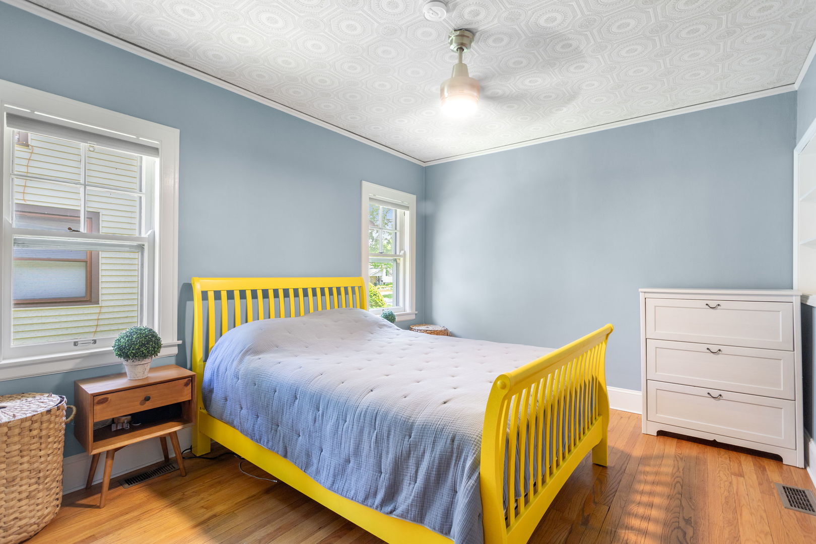 342 Lawton Road Riverside, IL 60546 - Photo 11 of 33 a bedroom with a bed and wooden floor