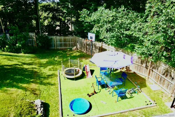 a backyard of a house with seating space
