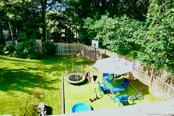 a view of an house with backyard