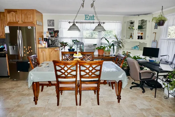 a view of a dining room with furniture