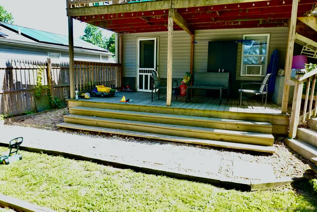 a view of outdoor sitting area with furniture