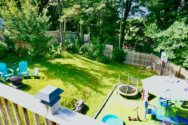 a backyard of a house with seating space
