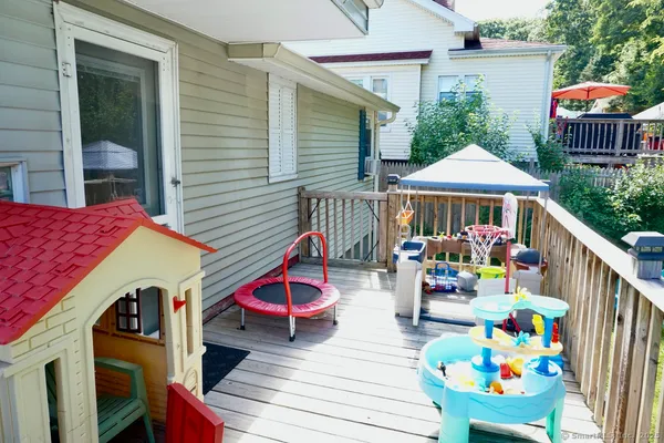 a view of outdoor sitting area with furniture