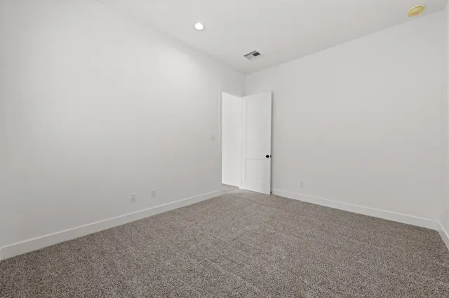 an empty room with an entryway
