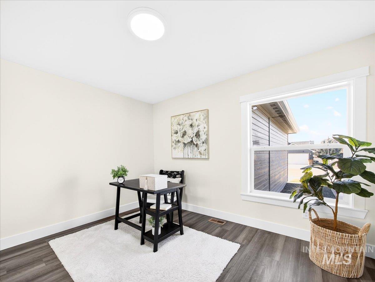 1410 Regency Way Emmett, ID 83617 - Photo 18 of 46 Office with baseboards and dark wood-style flooring