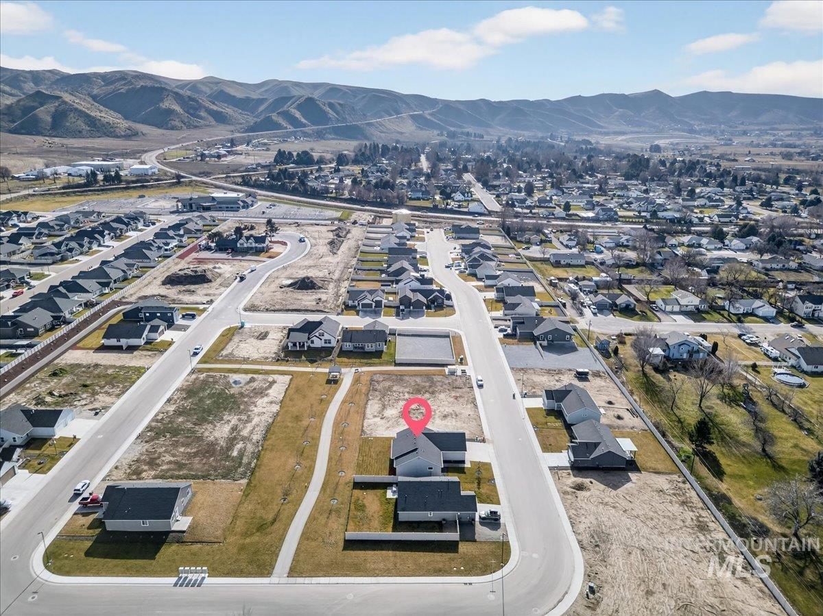 1410 Regency Way Emmett, ID 83617 - Photo 45 of 46 Aerial view of property's location with nearby suburban area and a mountainous background