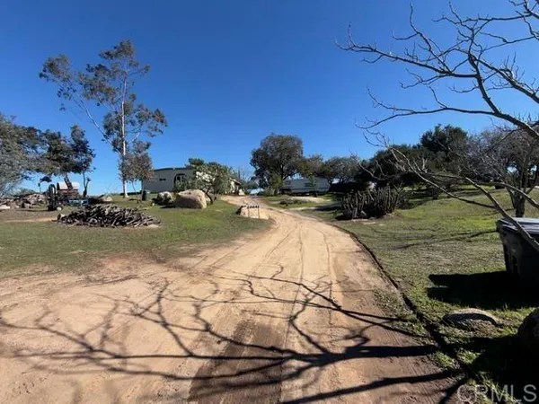 a view of swimming pool with a yard