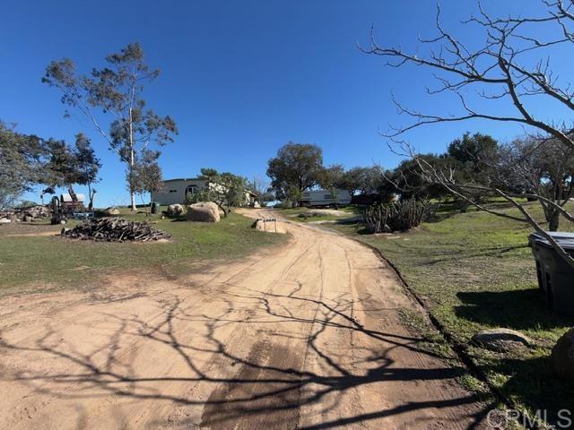 20042 Deerhorn Valley Road Jamul, CA 91935 - Photo 4 of 15 a view of swimming pool with a yard