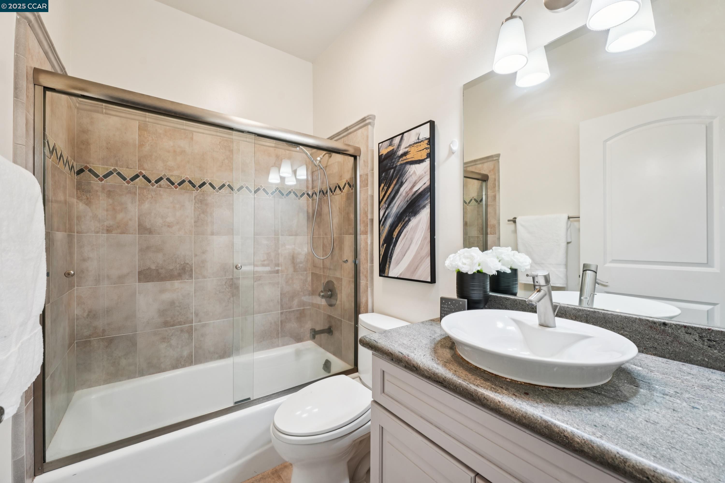 1539 Geary Road, Unit C Walnut Creek, CA 94597 - Photo 13 of 21 a bathroom with a sink and a mirror
