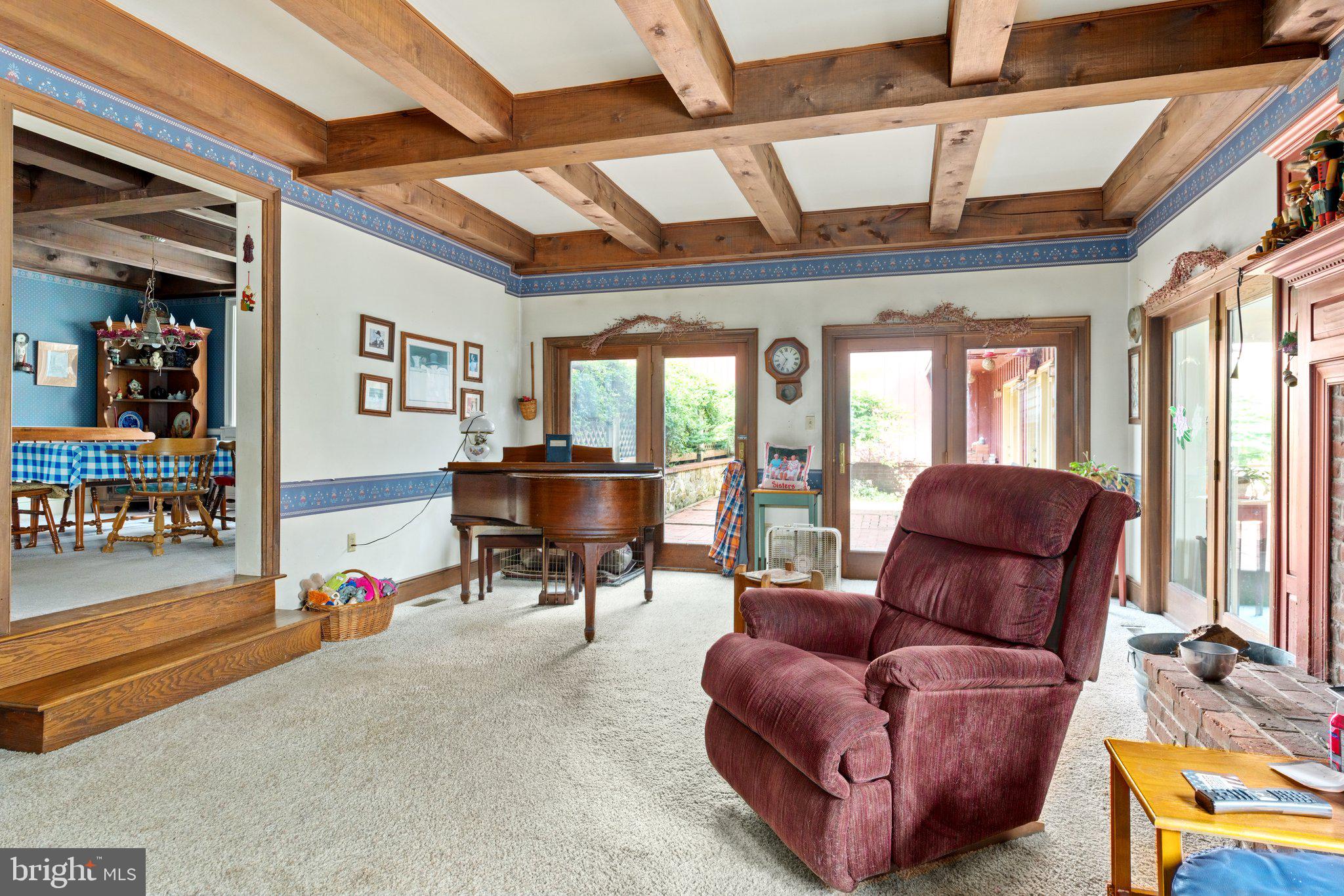 1760 Kumry Road Quakertown, PA 18951 - Photo 34 of 57 Family room accesses brick patio and 3 season room