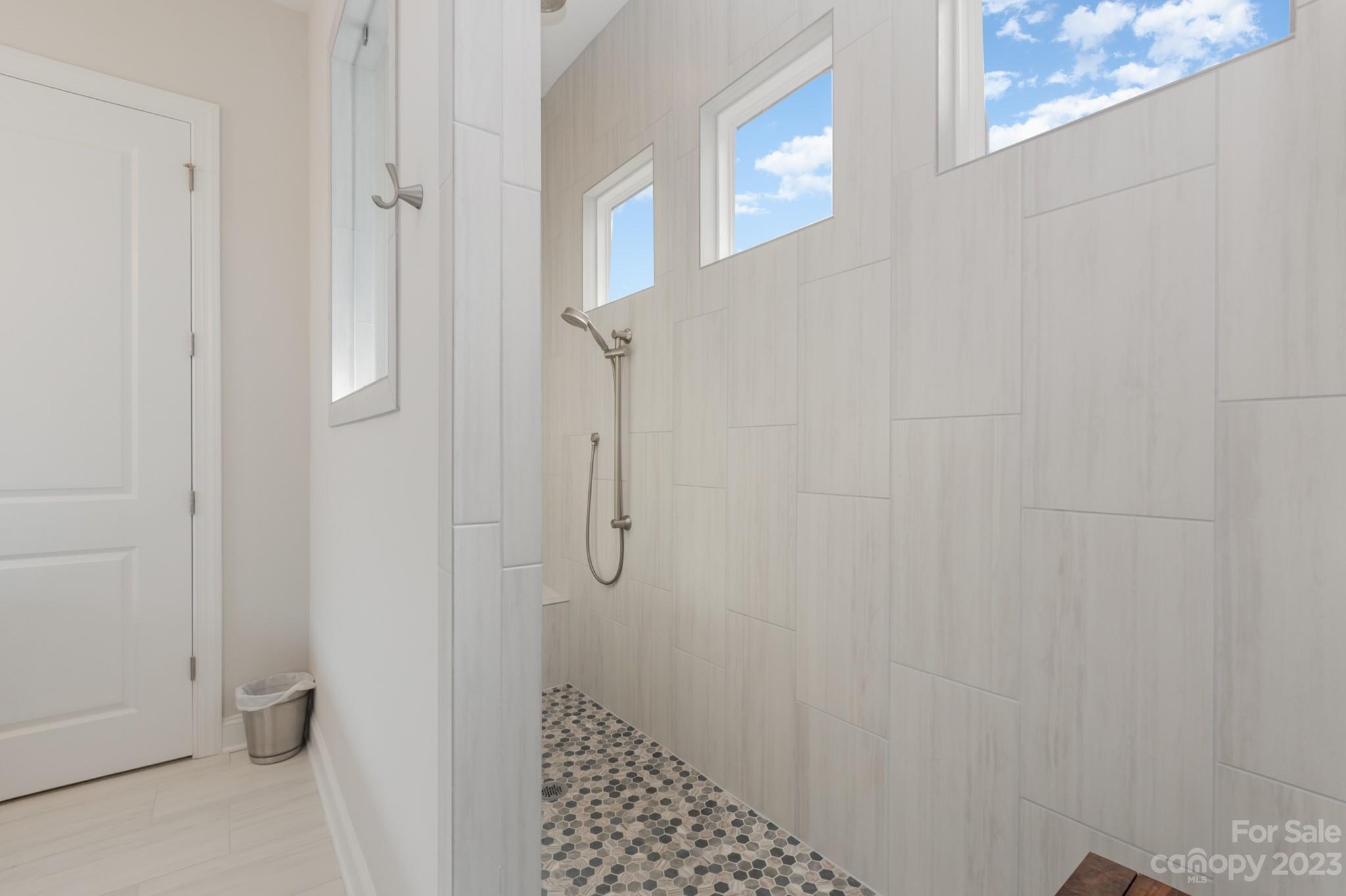 17150 Sand Bank Road Charlotte, NC 28278 - Photo 16 of 32 a bathroom with a shower