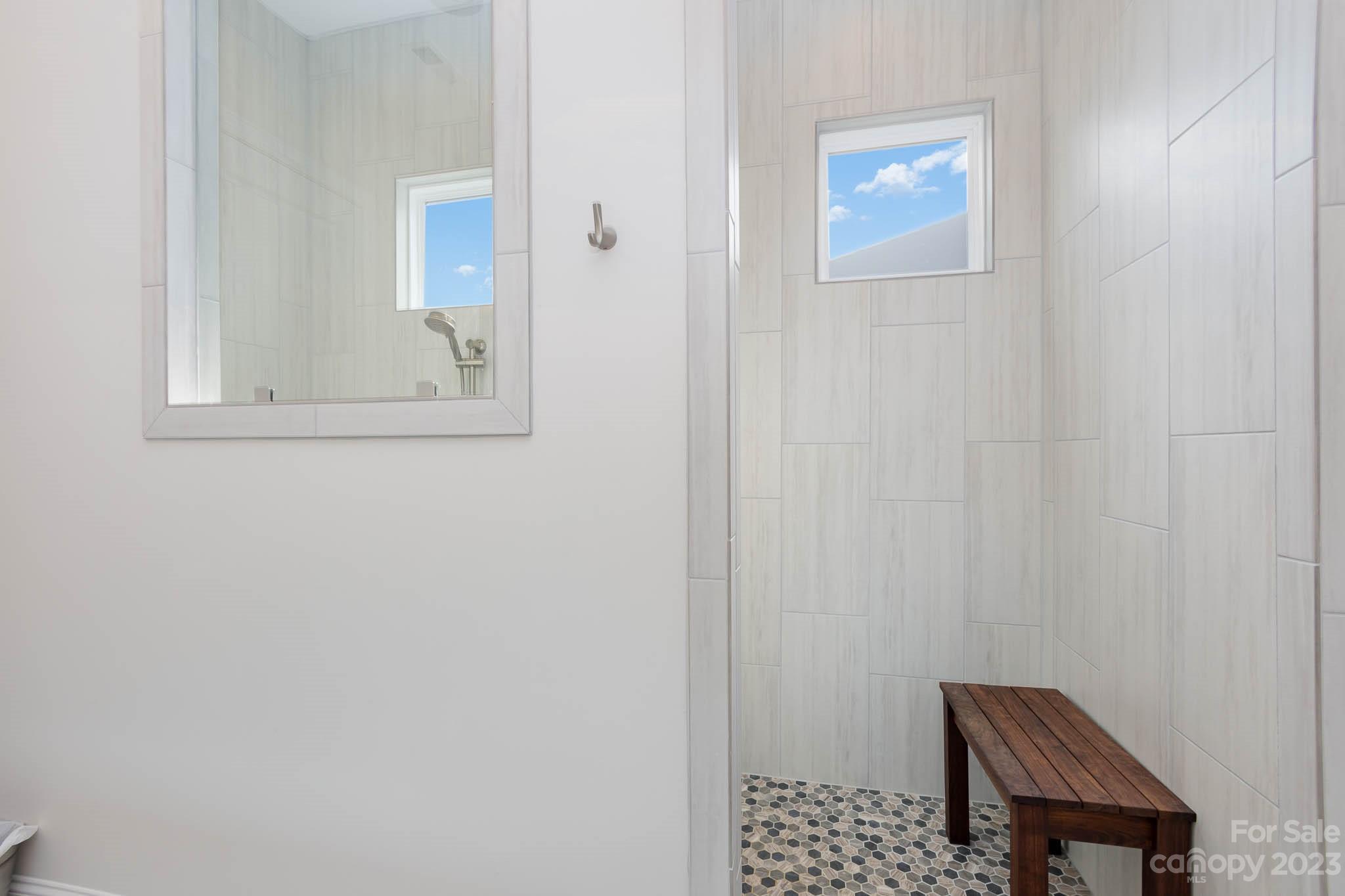17150 Sand Bank Road Charlotte, NC 28278 - Photo 18 of 32 a bathroom with a sink and a mirror