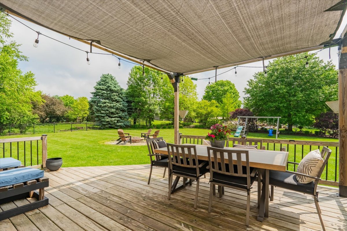 13561 Buck Road Bloomington, IL 61705 - Photo 37 of 43 a view of a patio with wooden floor