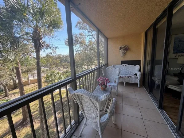 a view of a porch with furniture
