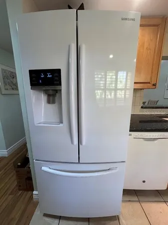 a white bath tub sitting in a bathroom