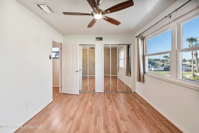 a view of a hallway with entryway