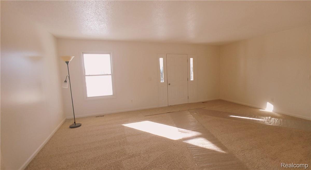 886 Chase Lake Road Howell, MI 48855 - Photo 4 of 52 2. The main entrance of home opens into nice size living room