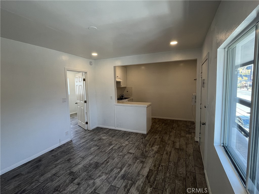 3112 Washington Boulevard Venice, CA 90291 - Photo 7 of 13 a view of a hallway with wooden floor and a bathroom