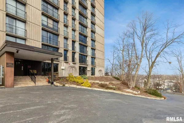 a view of a building with a street