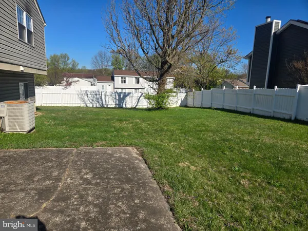 a view of a garden with an outdoor space