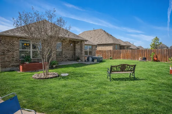 a garden view with a seating space