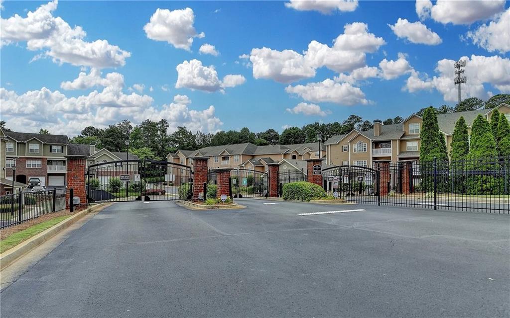 3500 Sweetwater Road, Unit 424 Duluth, GA 30096 - Photo 1 of 17 a view of a street with many cars