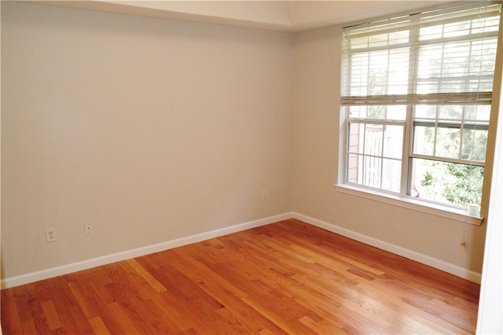 3500 Sweetwater Road, Unit 424 Duluth, GA 30096 - Photo 11 of 17 an empty room with a window
