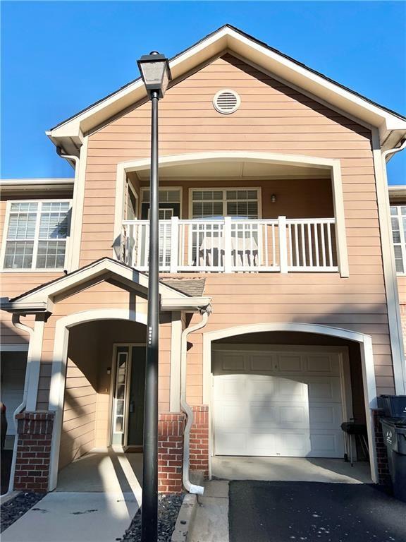 3500 Sweetwater Road, Unit 424 Duluth, GA 30096 - Photo 17 of 17 a front view of a house with a balcony