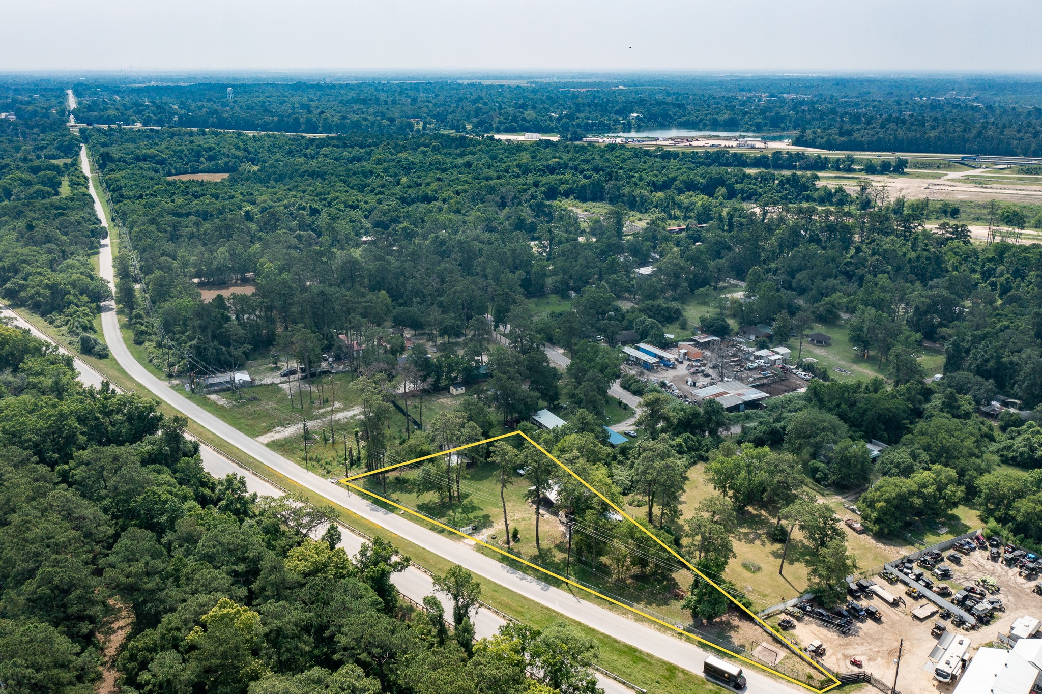 1421 Gulf Pump Road Crosby, TX 77532 - Photo 3 of 11 a view of a green landscape from a balcony