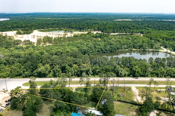 a view of lake with green space