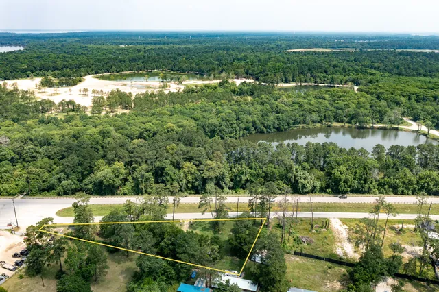 a view of lake with green space