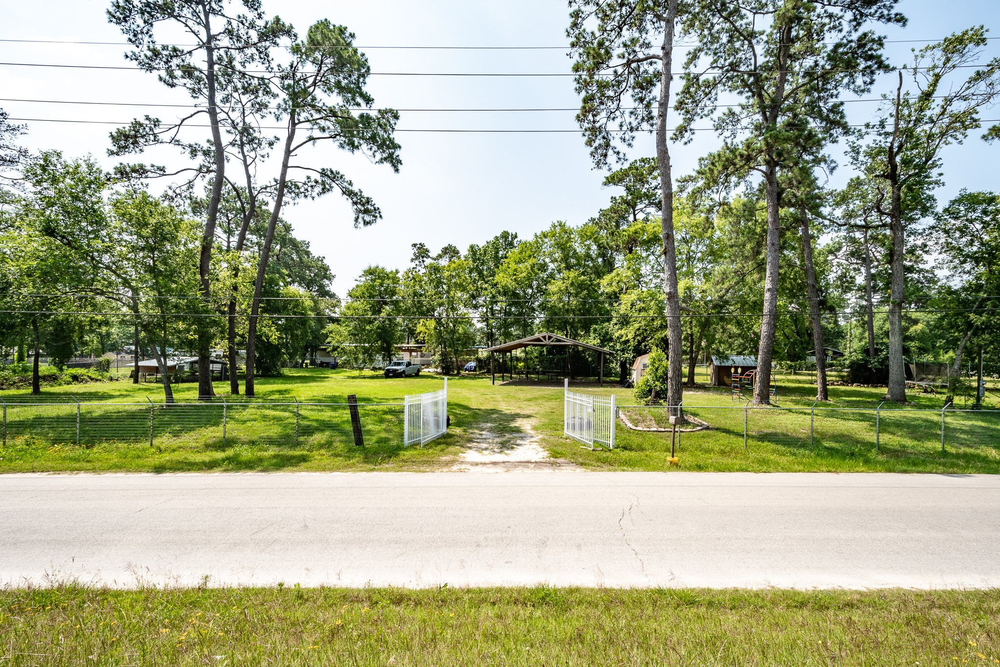 1421 Gulf Pump Road Crosby, TX 77532 - Photo 6 of 11 a view of a park with large trees