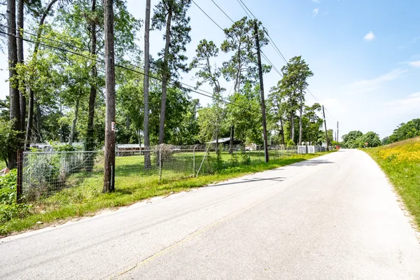 a view of lake with green space