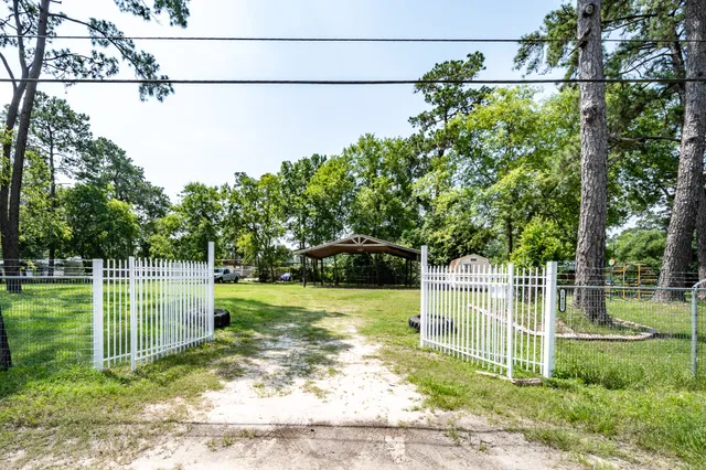 a view of a yard with a slide