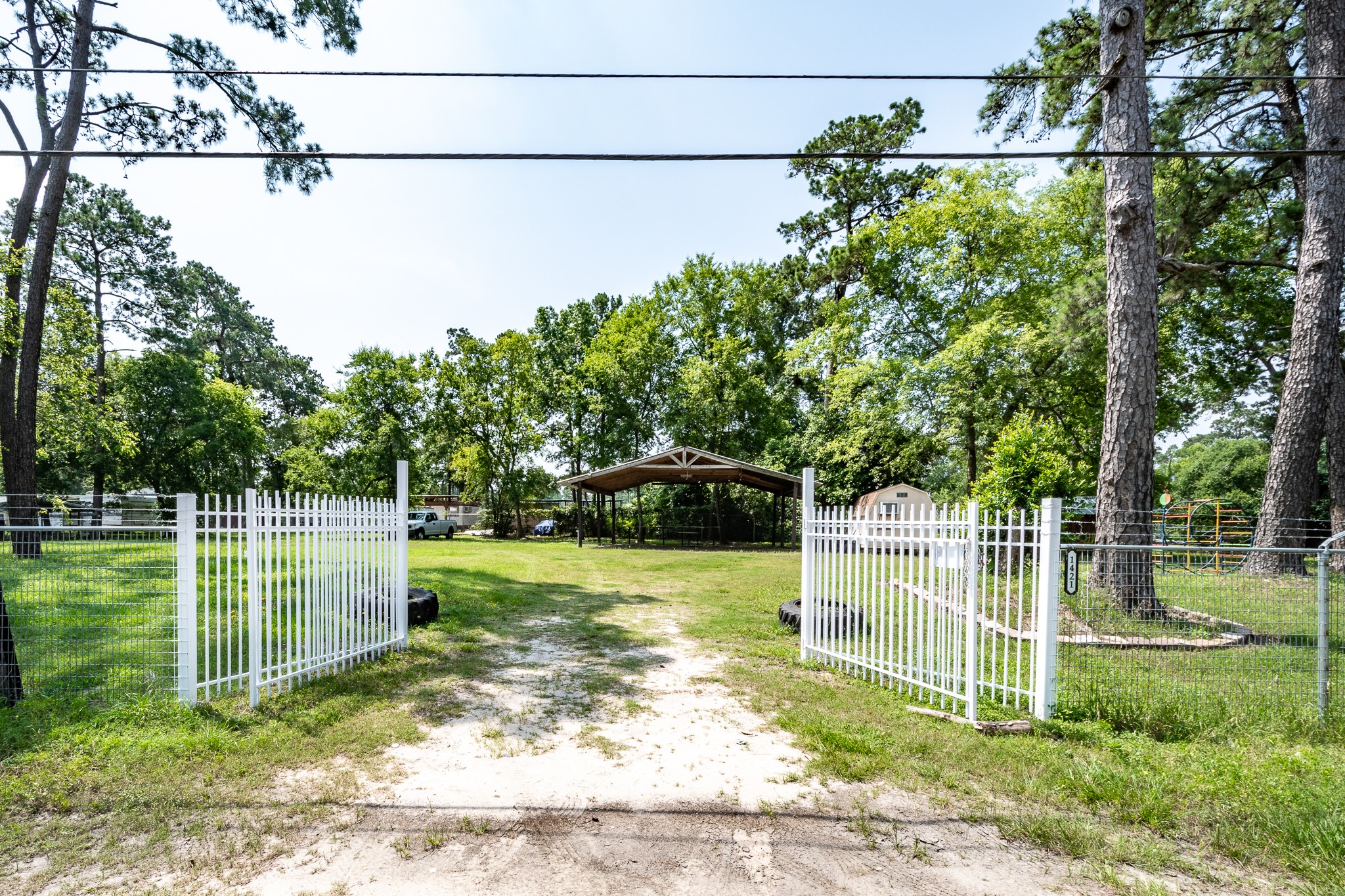 1421 Gulf Pump Road Crosby, TX 77532 - Photo 9 of 11 a view of a yard with a slide