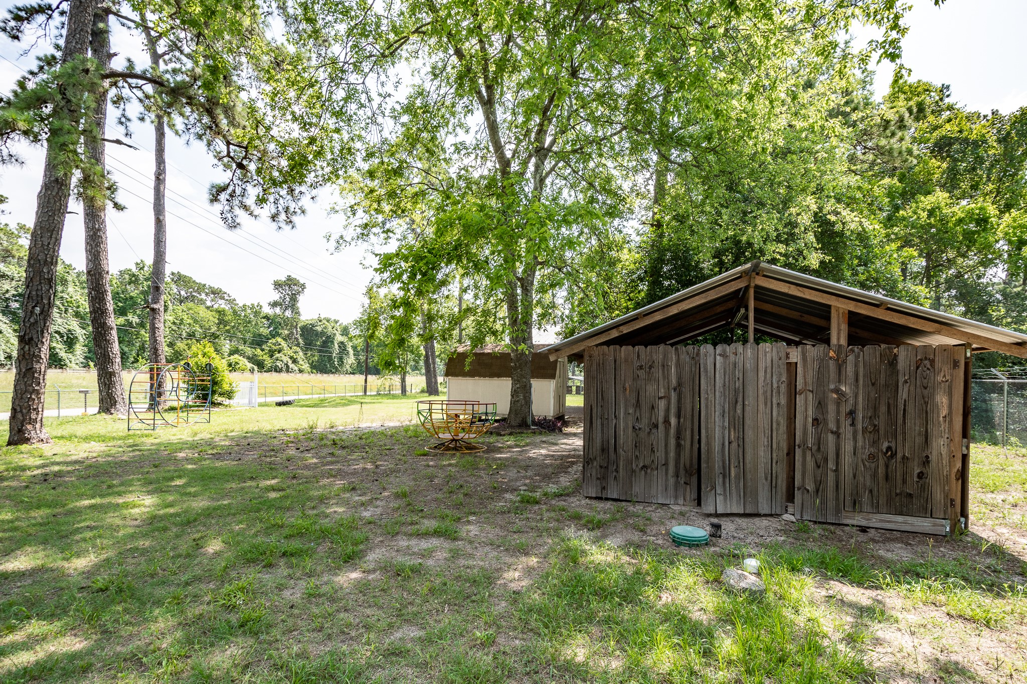 1421 Gulf Pump Road Crosby, TX 77532 - Photo 10 of 11 a view of backyard of house with green space