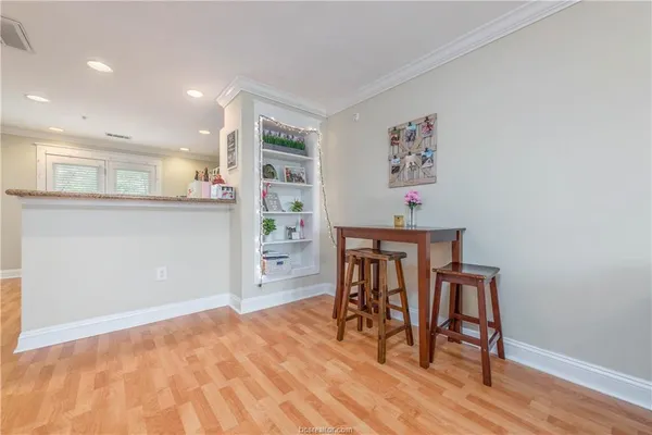 a workspace with furniture and window