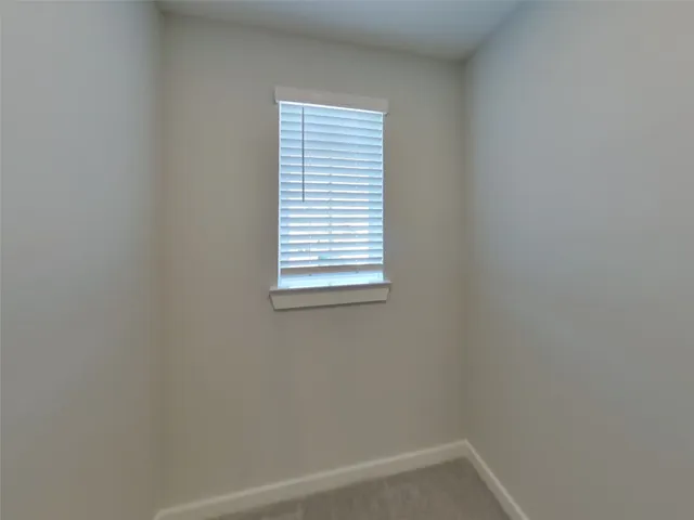 a view of backyard with a tub