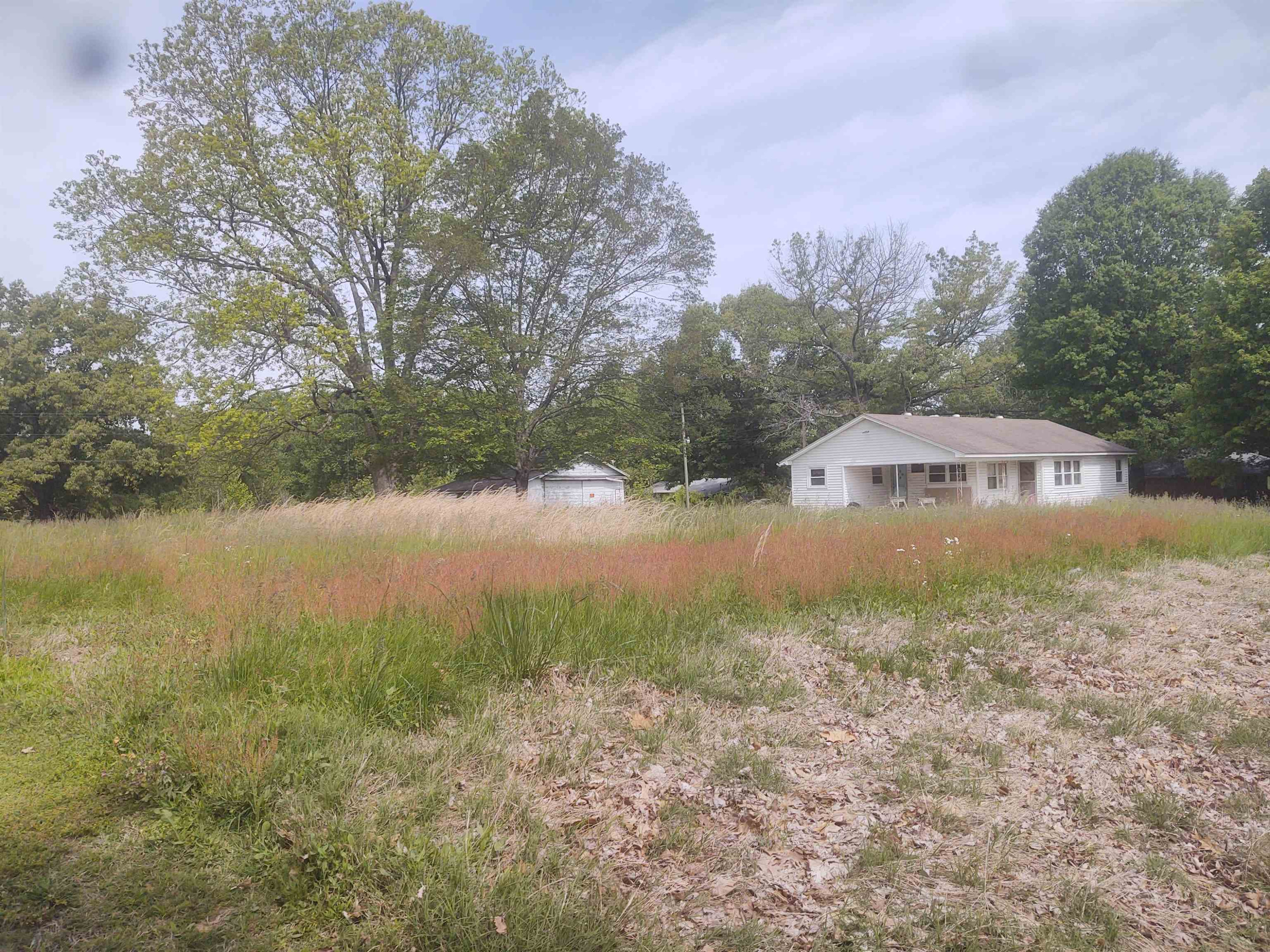 4755 South Union Grove Road Kenton, TN 38233 - Photo 2 of 10 a view of a lake from a yard
