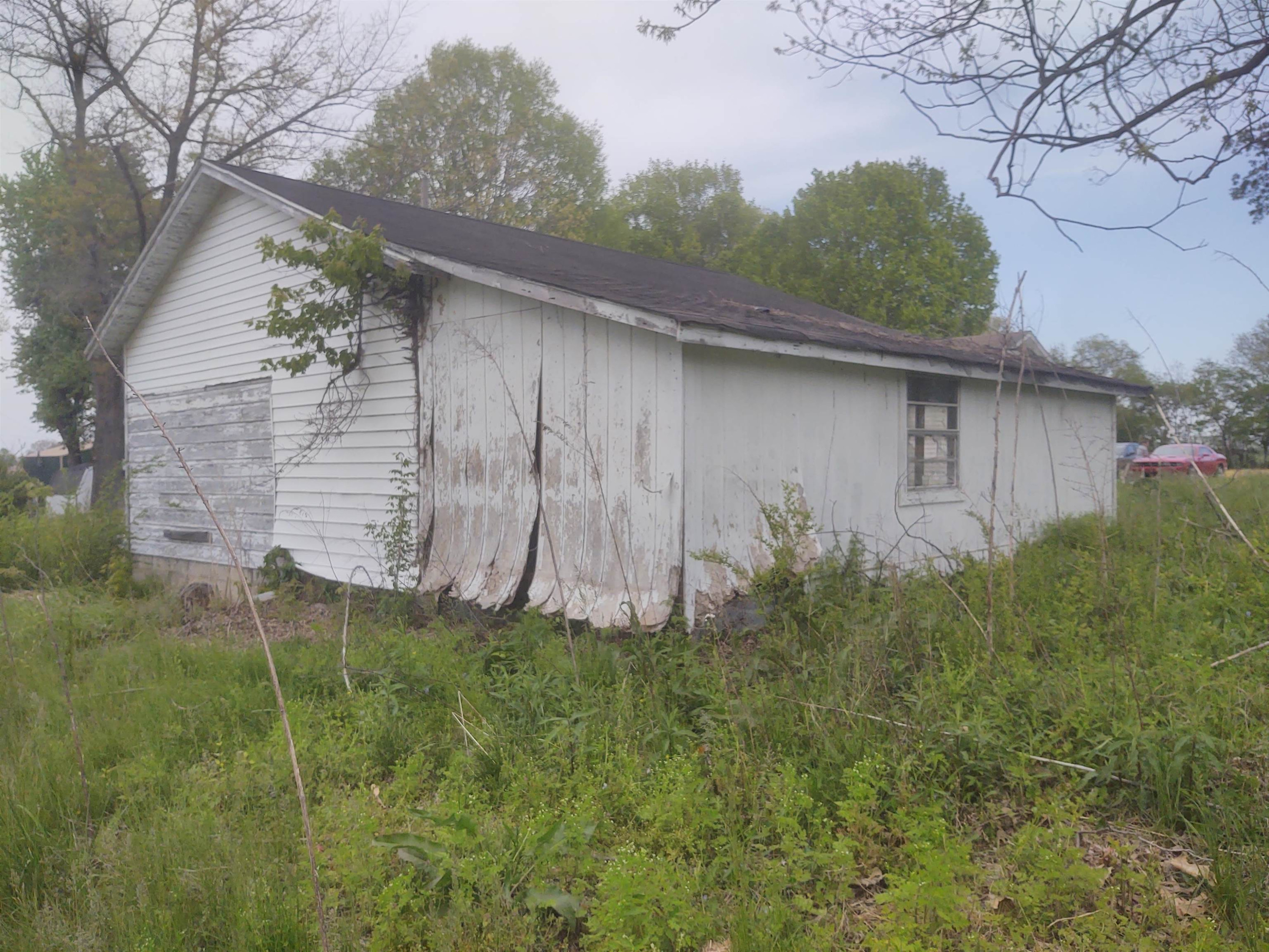 4755 South Union Grove Road Kenton, TN 38233 - Photo 7 of 10 a backyard of a house with lots of green space