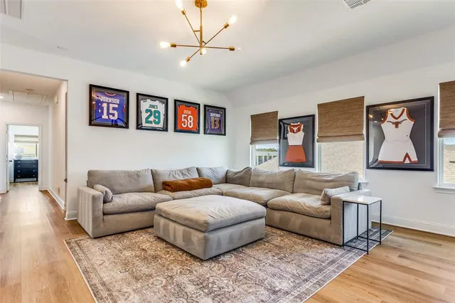 a living room with furniture and a rug