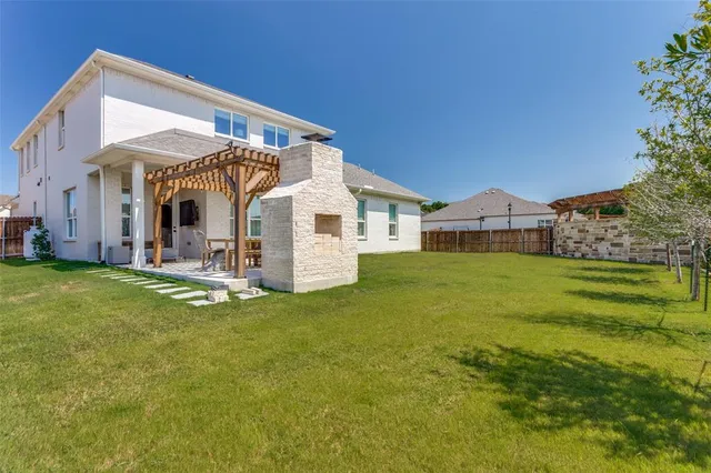 a view of a house with a big yard