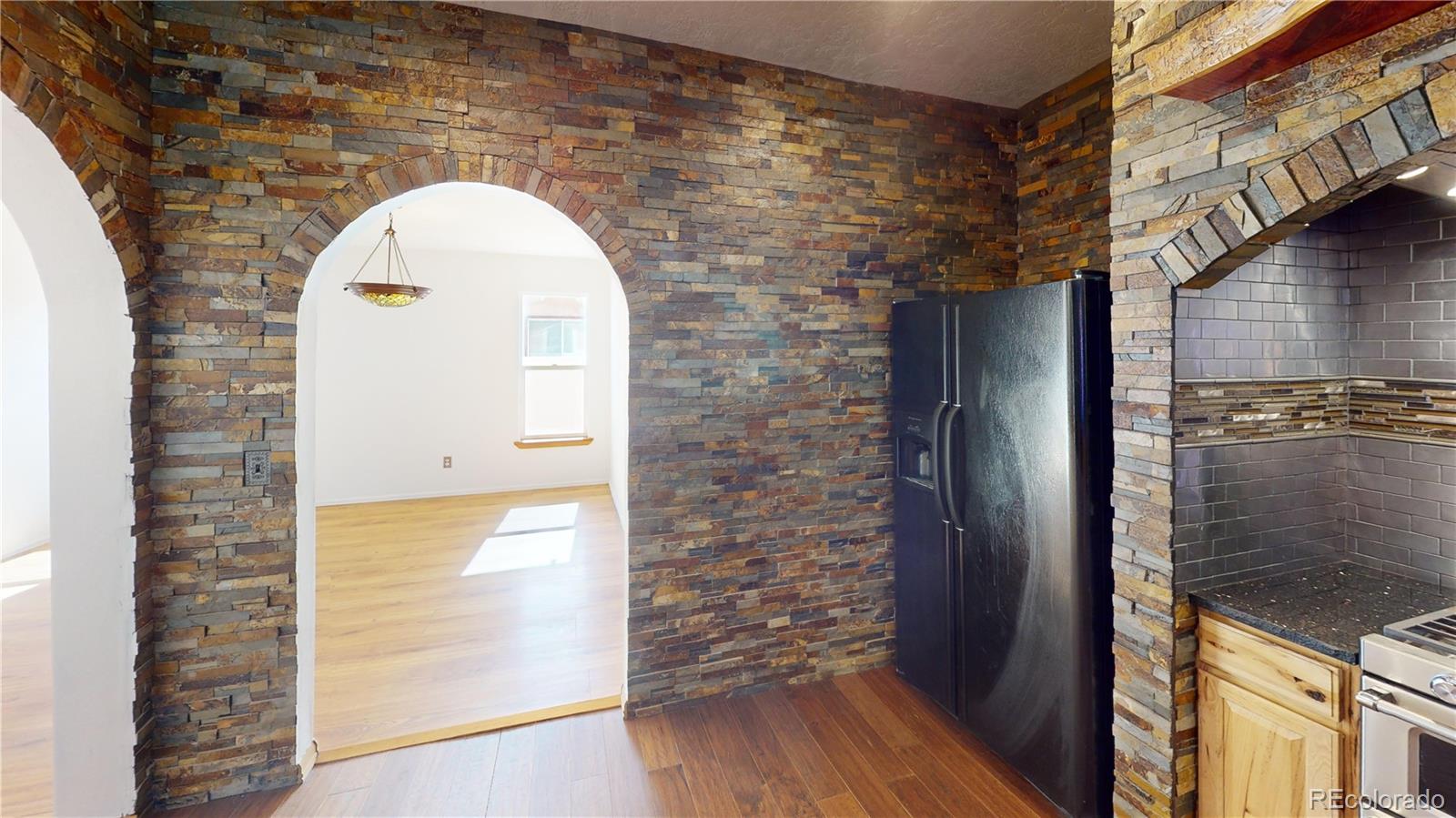 309 Main Street Romeo, CO 81148 - Photo 15 of 41 a view of a wooden door with a glass door