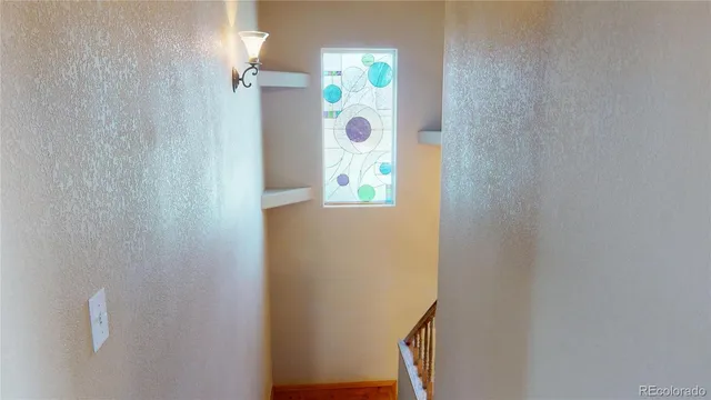 a view of livingroom with furniture and a window