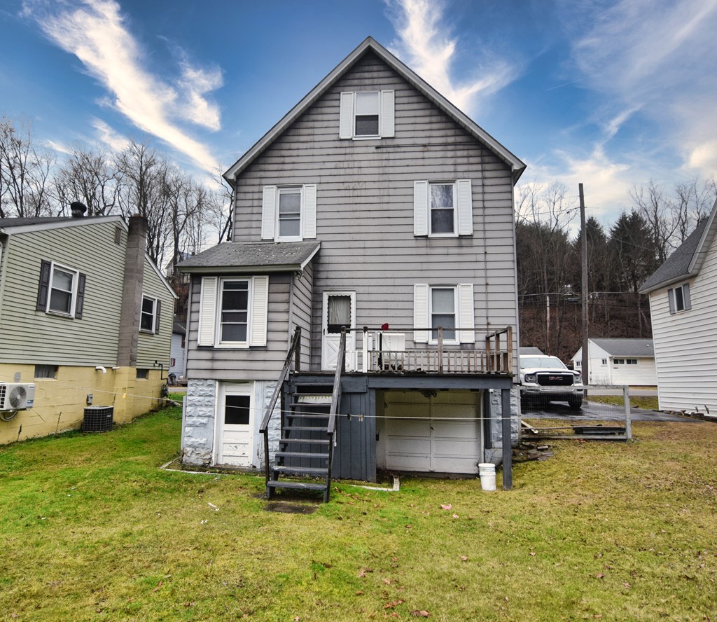 126 Cherry Run Road Rouseville, PA 16344 - Photo 3 of 20 a view of a house with a patio and a yard