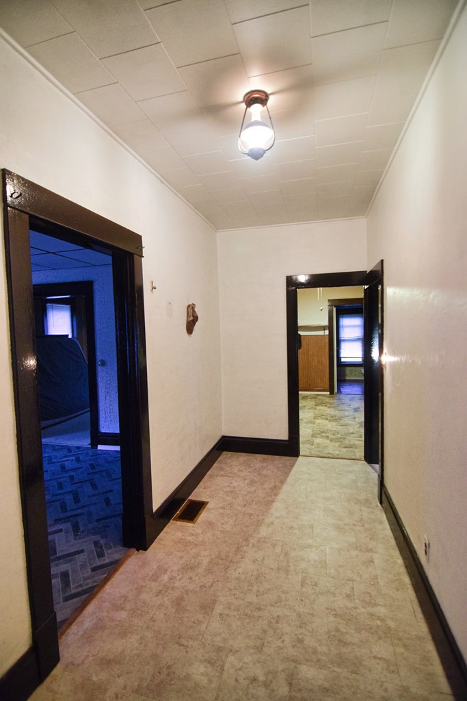 126 Cherry Run Road Rouseville, PA 16344 - Photo 8 of 20 a view of a hallway with wooden floor and closet