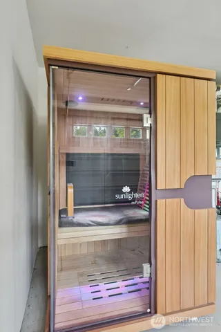 a bathroom with a bathtub a sink a vanity and a shower